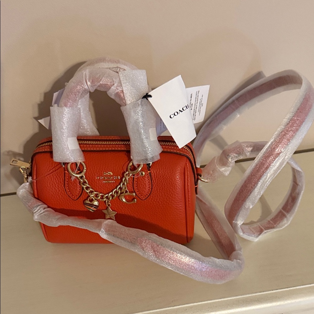 Coach orange mini Rowan Bag with Gold Chain